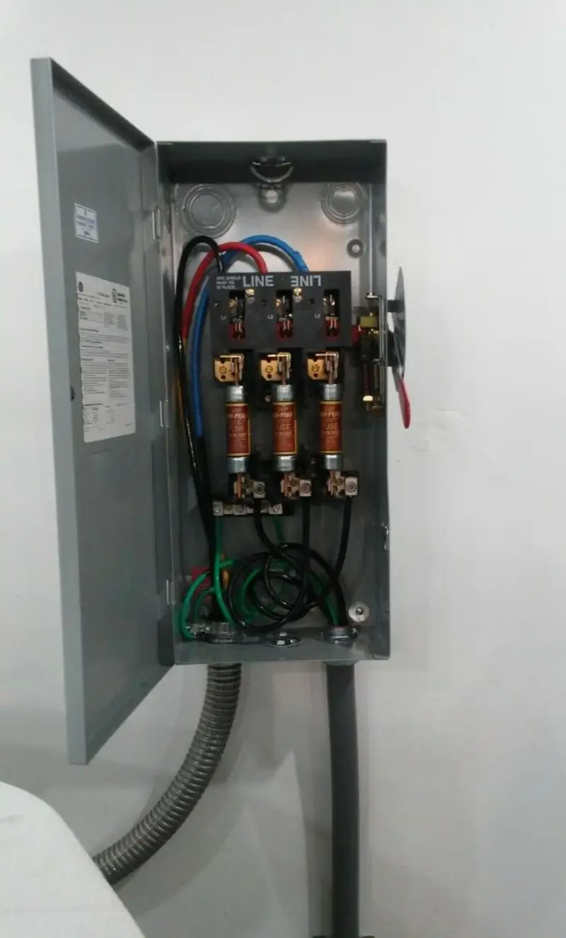 Three-phase disconnect switch installed for Smoke Detector Installation in Burley